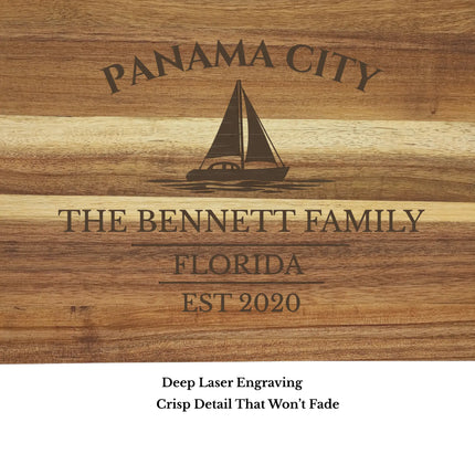 close up of panama city sailboat cutting board engraving detail custom boat name on acacia wood