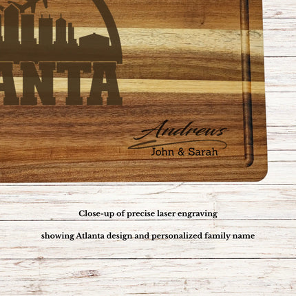 Close up of laser engraved Atlanta skyline baseball design on personalized acacia wood cutting board