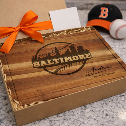Personalized Baltimore baseball cutting board presented in gift box with ribbon as a custom gift for baseball fans