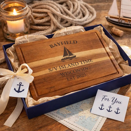 Personalized Bayfield Wisconsin cutting board in gift box with candle rope and nautical decor perfect for sailor gift giving