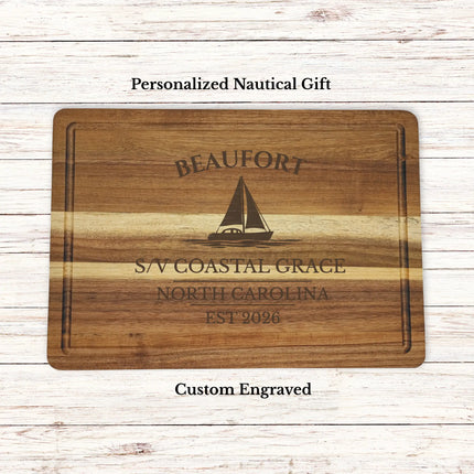 Personalized Beaufort North Carolina sailboat cutting board engraved with boat or family name and established year on acacia wood