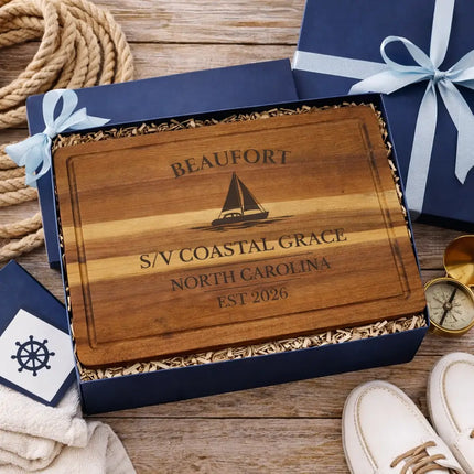 Beaufort sailboat cutting board presented in nautical themed gift box with rope compass and coastal elements