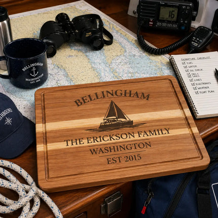 Bellingham Washington sailboat cutting board on a navigation table with charts checklist binoculars and gear ready for departure