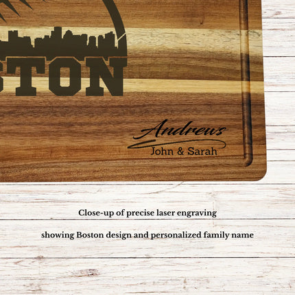 Close up of laser engraved Boston skyline baseball design on personalized acacia wood cutting board