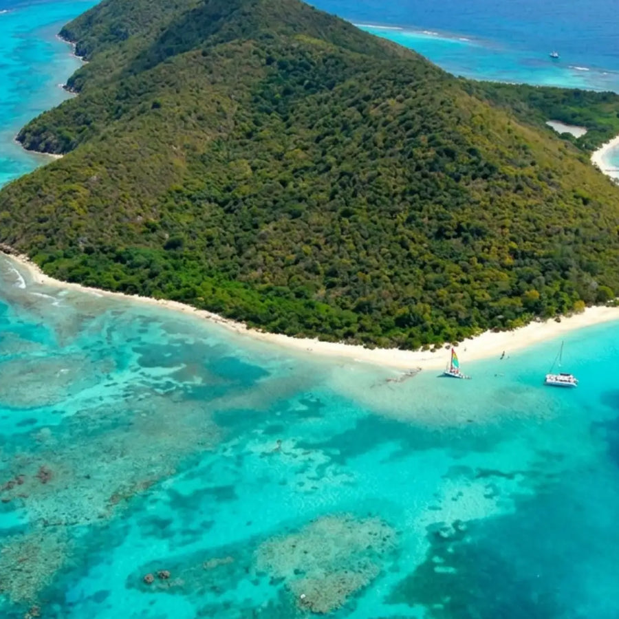 Aerial view of Buck Island Reef National Monument highlighting turquoise reefs, white sand beaches, and protected Caribbean waters near St. Croix.