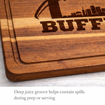 Close-up of the deep juice groove on a personalized Buffalo football acacia wood cutting board, showing the carved channel around the edge to help contain spills during prep or serving