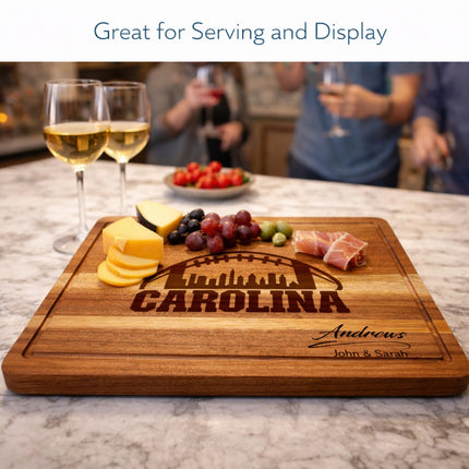 Carolina cutting board used for serving charcuterie and snacks with football skyline laser engraving