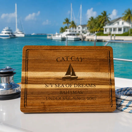 Cat Cay Bahamas sailboat cutting board at a tropical offshore marina with turquoise water refined cruising boats and classic Bahamas boating atmosphere