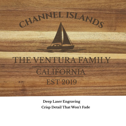 Close up of Channel Islands California sailboat cutting board engraving showing detailed laser etched sailboat design and acacia wood grain