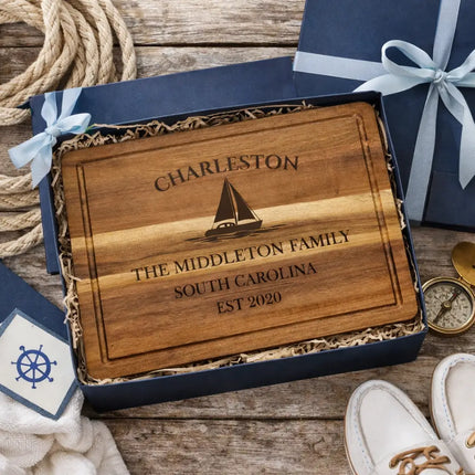 Charleston sailboat cutting board presented as a nautical themed gift with coastal wrapping and decor