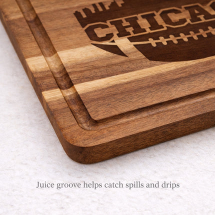 Close-up of Chicago football cutting board showing juice groove detail, solid acacia wood with deep natural laser engraving