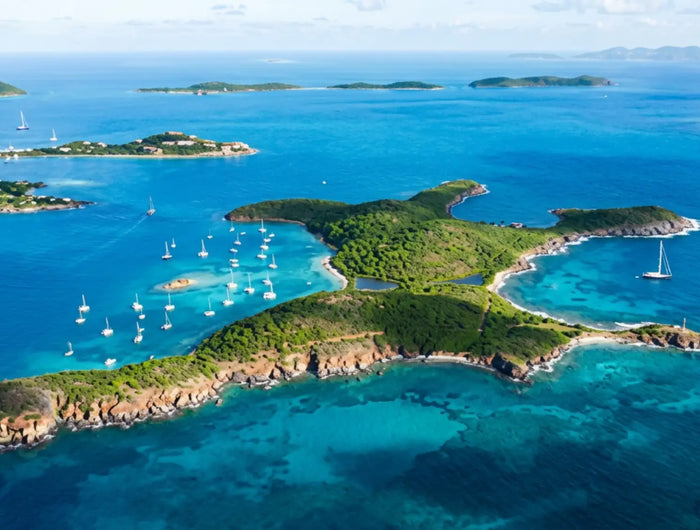 Aerial view of Christmas Cove and Great Saint James with anchored sailboats in the U.S. Virgin Islands.