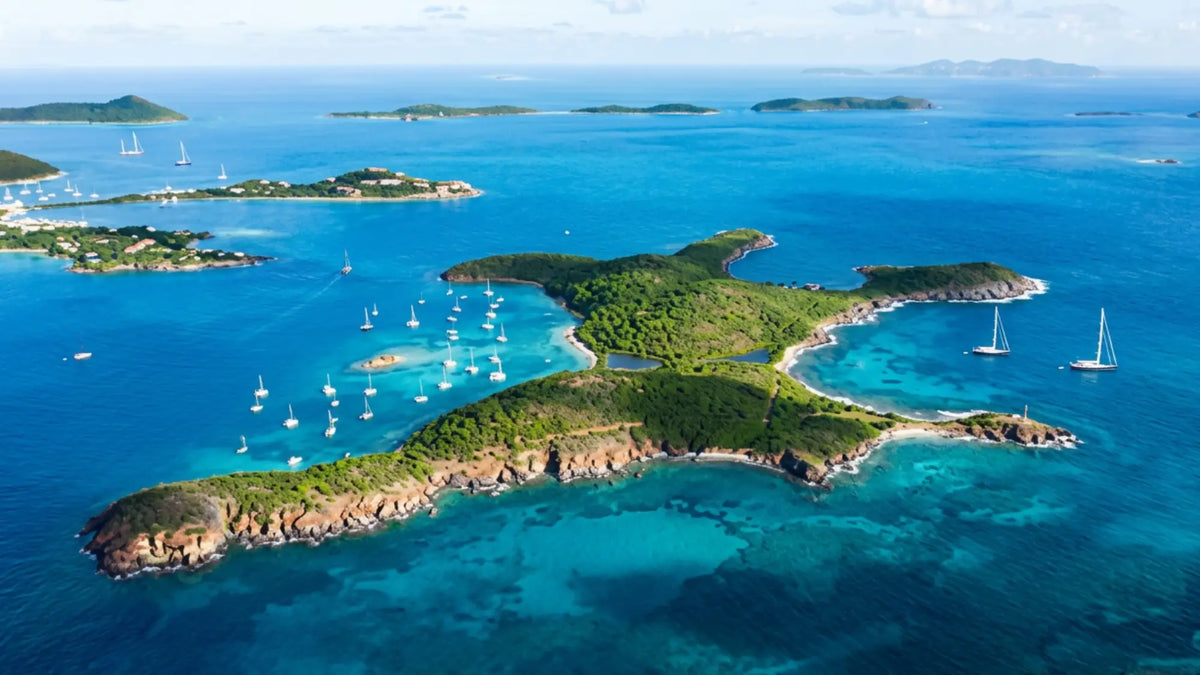 Aerial view of Christmas Cove and Great Saint James with anchored sailboats in the U.S. Virgin Islands.