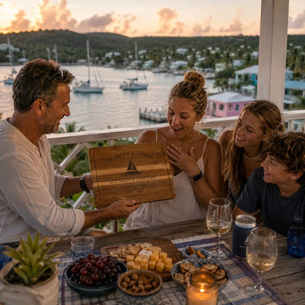 Clarence Town Bahamas personalized cutting board being shared during a relaxed harbor overlook gathering with sailboats and tropical scenery on Long Island