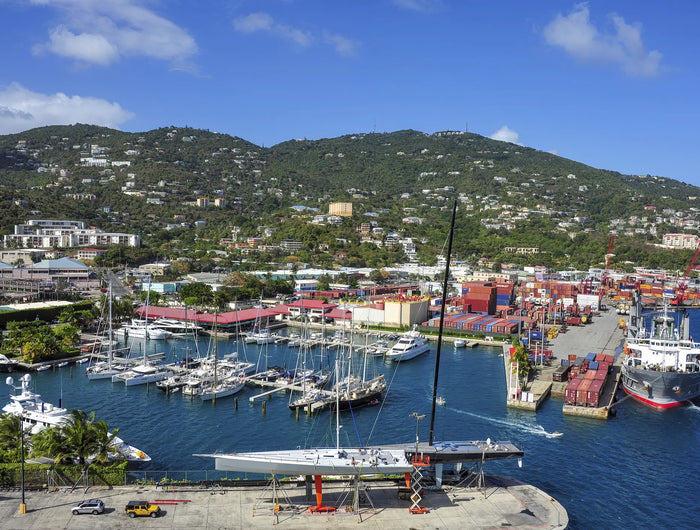 Aerial view of Crown Bay Harbor Marina on St. Thomas in the U.S. Virgin Islands showing marinas, recreational boats, and the working harbor.