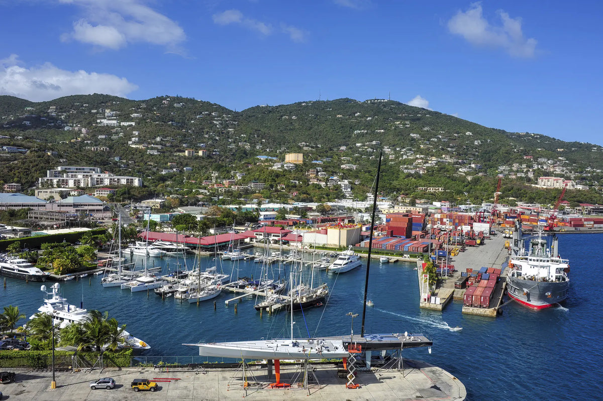 Aerial view of Crown Bay Harbor Marina on St. Thomas in the U.S. Virgin Islands showing marinas, recreational boats, and the working harbor.