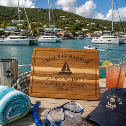 Cruz Bay Harbor US Virgin Islands sailboat cutting board displayed overlooking turquoise mooring fields catamarans and lush St John hillsides