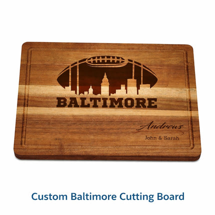 Custom Baltimore cutting board with natural brown laser engraving featuring football skyline design and personalized family name