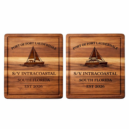 Side-by-side comparison of personalized Fort Lauderdale sailboat cutting boards showing monohull and catamaran design options, engraved with boat name, home port, and established year