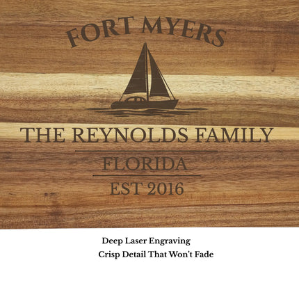 close up of fort myers sailboat cutting board engraving detail custom boat name on acacia wood