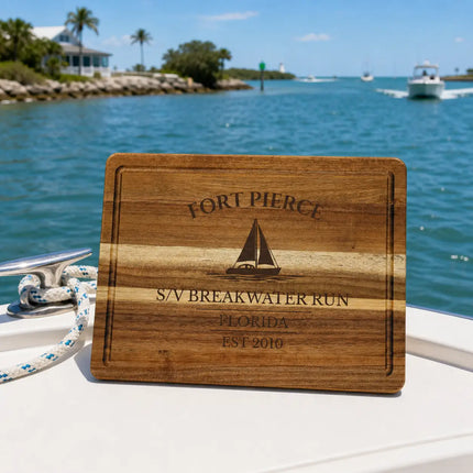 Fort Pierce Florida sailboat cutting board on a dock near open water with inlet view and clear sky in bright daylight