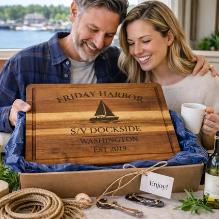Friday Harbor Washington personalized cutting board being opened as a nautical gift at the marina with coastal themed presentation