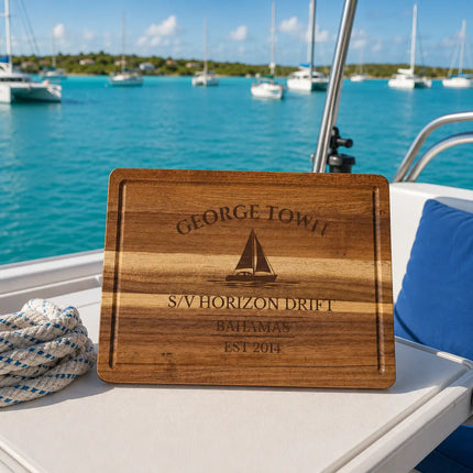 George Town Bahamas sailboat cutting board overlooking calm turquoise Elizabeth Harbour with anchored cruising sailboats in the Exumas