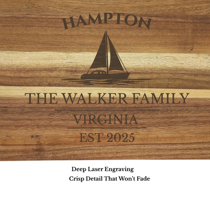 Close up of Hampton Virginia sailboat engraving on acacia wood cutting board showing detailed laser engraving