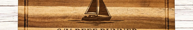 Personalized Harbor Collection acacia wood cutting board featuring a custom home port design with harbor name, sailboat graphic, family or boat name, region, and established year.