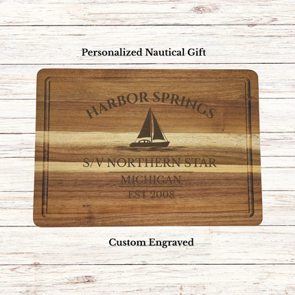 Harbor Springs Michigan sailboat cutting board personalized with boat name S V Northern Star custom engraved nautical gift