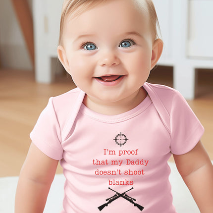Humorous Dad-Themed Baby Bodysuit: "My Daddy Doesn't Shoot Blanks"
