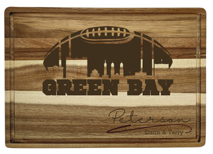 Custom Green Bay football cutting board featuring the city skyline and a football design. Personalized as requested to make a great gift.