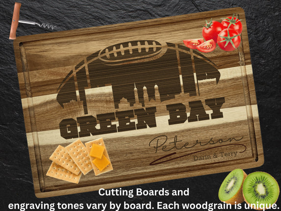 Custom Green Bay football cutting board featuring the city skyline and a football design. Personalized as requested to make a great gift.