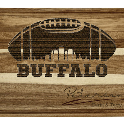 Custom Buffalo football cutting board featuring the city skyline and a football design. Personalized as requested to make a great gift.