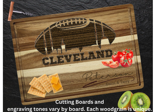 Custom Cleveland football cutting board featuring the city skyline and a football design. Personalized as requested to make a great gift.