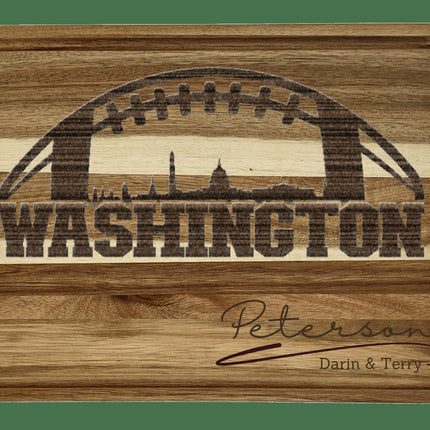 Custom Washington football cutting board featuring the city skyline and a football design. Personalized as requested to make a great gift.