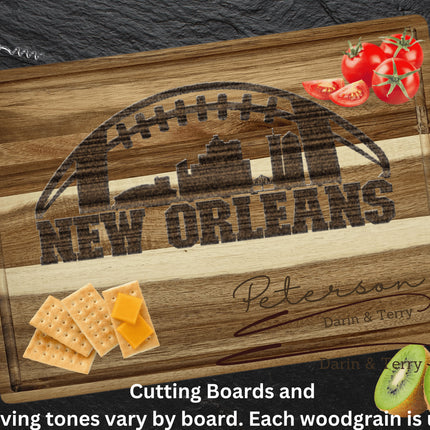 Custom New Orleans football cutting board featuring the city skyline and a football design. Personalized as requested to make a great gift.