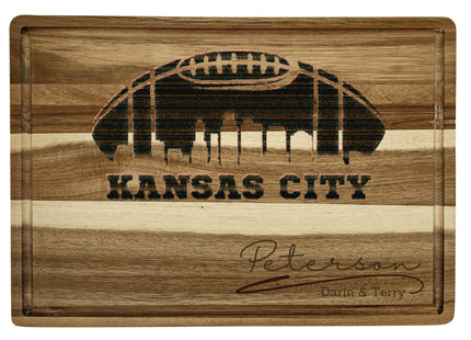 Custom Kansas City football cutting board featuring the city skyline and a football design. Personalized as requested to make a great gift.