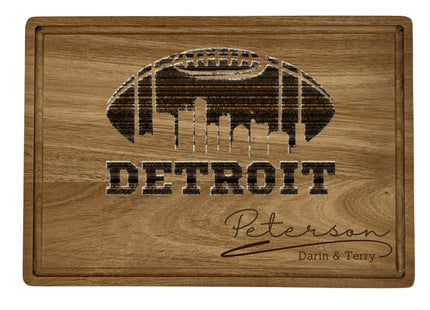 Custom Detroit football cutting board featuring the city skyline and a football design. Personalized as requested to make a great gift.
