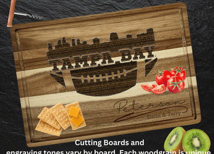 Custom Tampa Bay football cutting board featuring the city skyline and a football design. Personalized as requested to make a great gift.