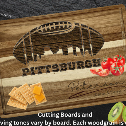 Custom Pittsburgh football cutting board featuring the city skyline and a football design. Personalized as requested to make a great gift.