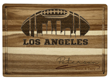 Custom Los Angeles football cutting board featuring the city skyline and a football design. Personalized as requested to make a great gift.