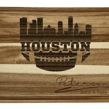 Custom Houston football cutting board featuring the city skyline and a football design. Personalized as requested to make a great gift.