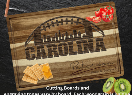 Custom Carolina football cutting board featuring the city skyline and a football design. Personalized as requested to make a great gift.
