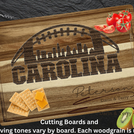 Custom Carolina football cutting board featuring the city skyline and a football design. Personalized as requested to make a great gift.