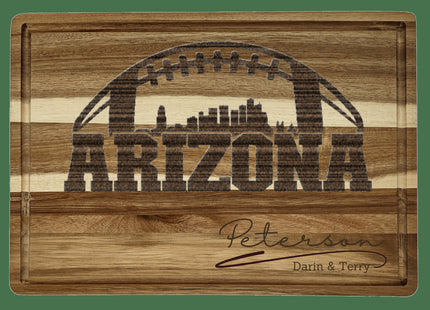 Custom Arizona football cutting board featuring the city skyline and a football design. Personalized as requested to make a great gift.