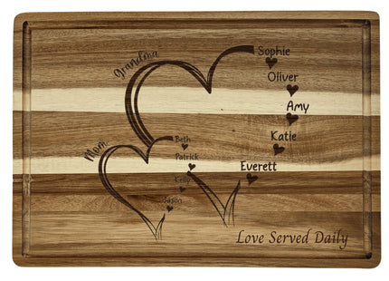 Custom family cutting board featuring the hearts and children&#39;s names. Personalized as requested to make a great gift.