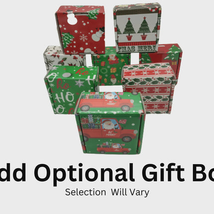 Stack of colorful holiday-themed gift boxes in various designs, including Christmas trees, snowmen, Santa Claus, and festive patterns. Text below reads “Add Optional Gift Box – Selection Will Vary,” indicating customers can choose to include a gift box with their order.