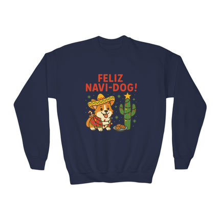 Navy blue crewneck sweatshirt featuring a festive “Feliz Navi-Dog!” Christmas design with a cheerful Corgi wearing a sombrero and poncho beside a cactus decorated like a Christmas tree with a star on top and a plate of cookies nearby. The phrase “FELIZ NAVI-DOG!” appears above the illustration in bold red letters.