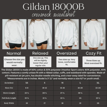 Gildan 18000B crewneck sweatshirt sizing guide showing four fit styles on a child model: Normal (true to size), Relaxed (one size up), Oversized (two sizes up), and Cozy Fit (three sizes up). Each fit shows a progressively looser and longer sweatshirt. Below, a size chart lists XS–XL measurements in inches for sleeve length, full body length, and body width, along with U.S. size equivalents. Text explains that the sweatshirt is a 50/50 cotton-poly blend with a unisex fit.